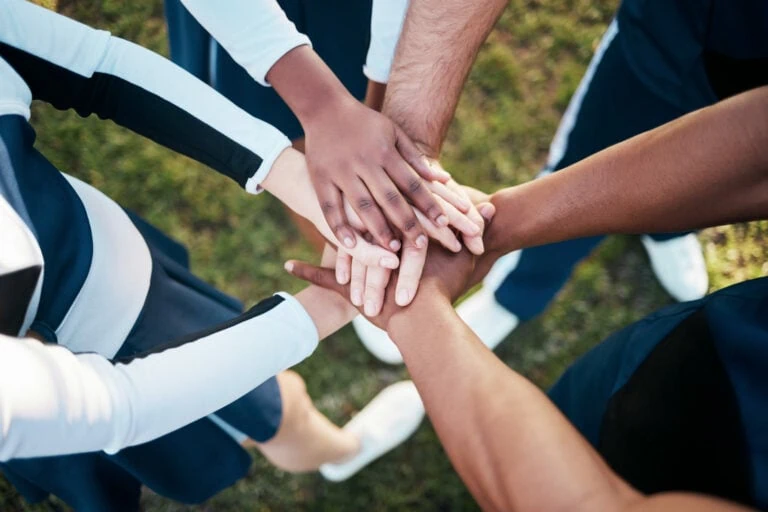 Hands together for cheer.