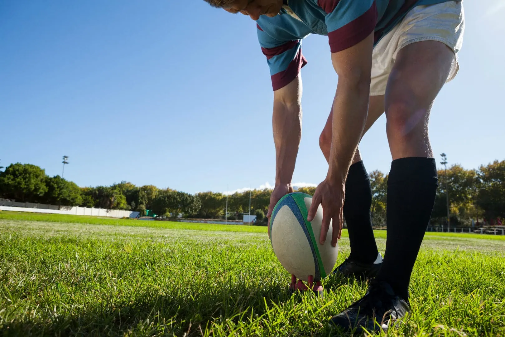 Rugby person about to kick